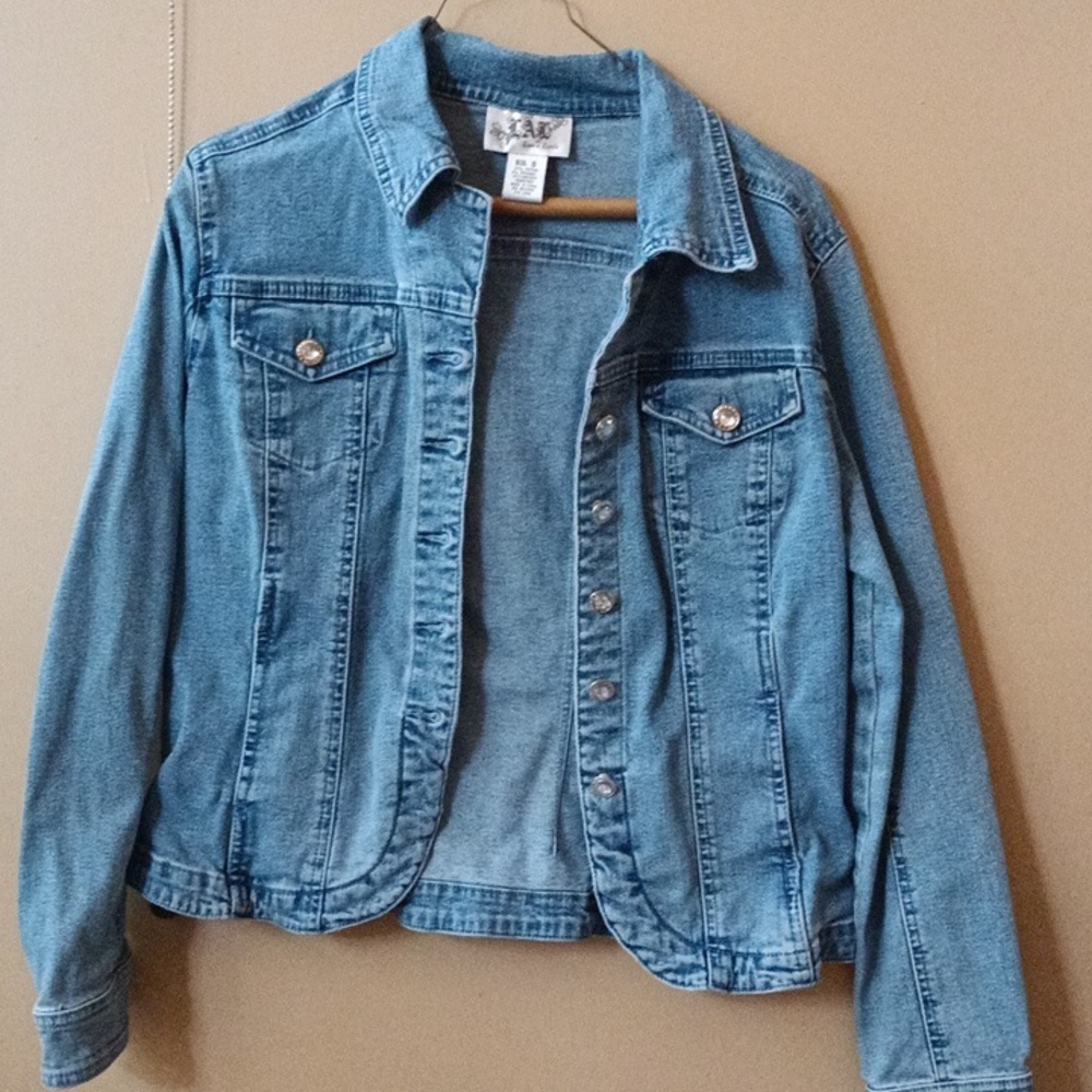 Love a little blue jean jacket with rhinestone buttons